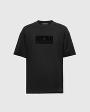 Crafted from soft Pima Cotton, the Psycho Bunny BIG AND TALL ROMEO HEAVY WEIGHT RELAXED FIT TEE - B9U110E200 is a black t-shirt showcasing a minimalist design with a horizontal rectangle featuring three stylized rabbit faces. This relaxed fit makes it an ideal choice for those seeking a stylish and comfortable big and tall t-shirt option.