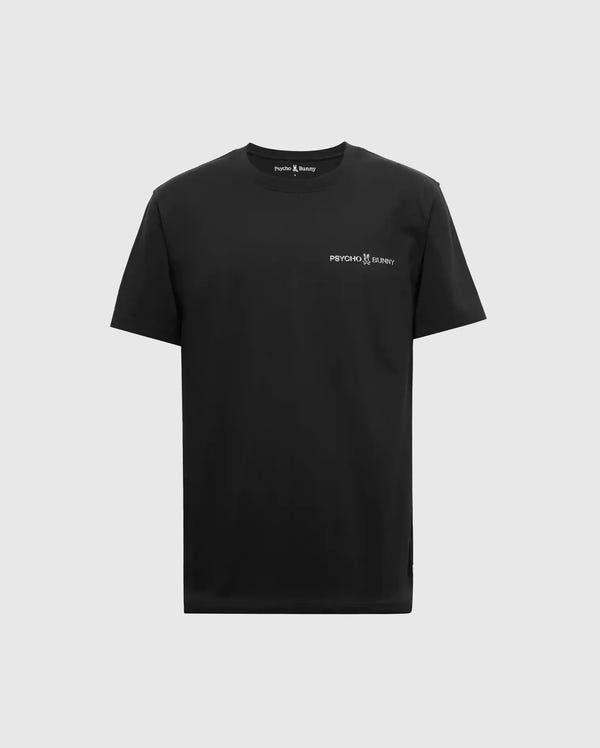 The BIG AND TALL LONMONT GRAPHIC TEE - B9U194E200 from Psycho Bunny is a black short-sleeved tee crafted from premium Pima cotton, showcasing a small white "Psycho Bunny" logo with a bunny graphic on the left chest. The shirt is set against a plain light gray background.