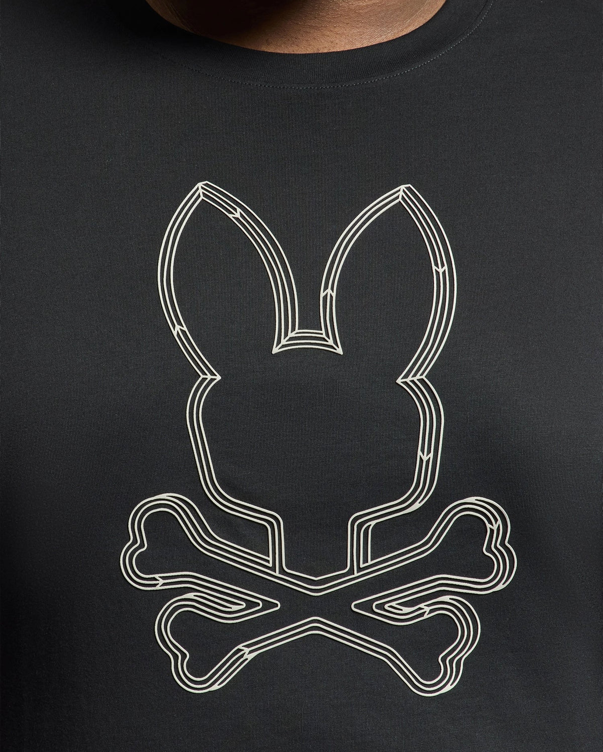 The Psycho Bunny Men's Big and Tall Monarc Front Bunny Graphic Tee, model B9U211E200, is a black premium Pima cotton tee featuring a white rabbit head outline with crossed bones.