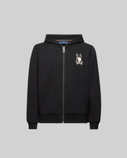 The KIDS WADE CORD PATCH ZIP HOODIE (KT0500016) by Psycho Bunny is a black zip-hoodie with front pockets, crafted from premium cotton, and features an embroidered Bunny head with crossbones on the left chest.