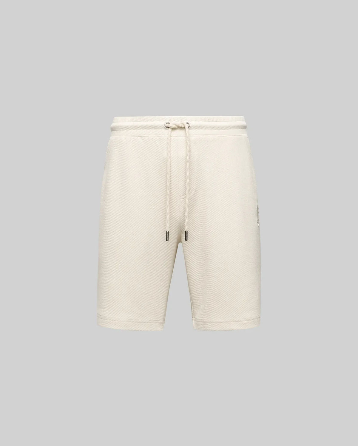 Psycho Bunny MENS KAI SWEATSHORT (MB0900015) in beige features a relaxed fit, elastic waistband with drawstring, and an embroidered Bunny logo, shown on a light gray background for a casual look.