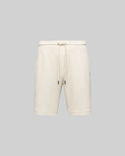 Psycho Bunny MENS KAI SWEATSHORT (MB0900015) in beige features a relaxed fit, elastic waistband with drawstring, and an embroidered Bunny logo, shown on a light gray background for a casual look.