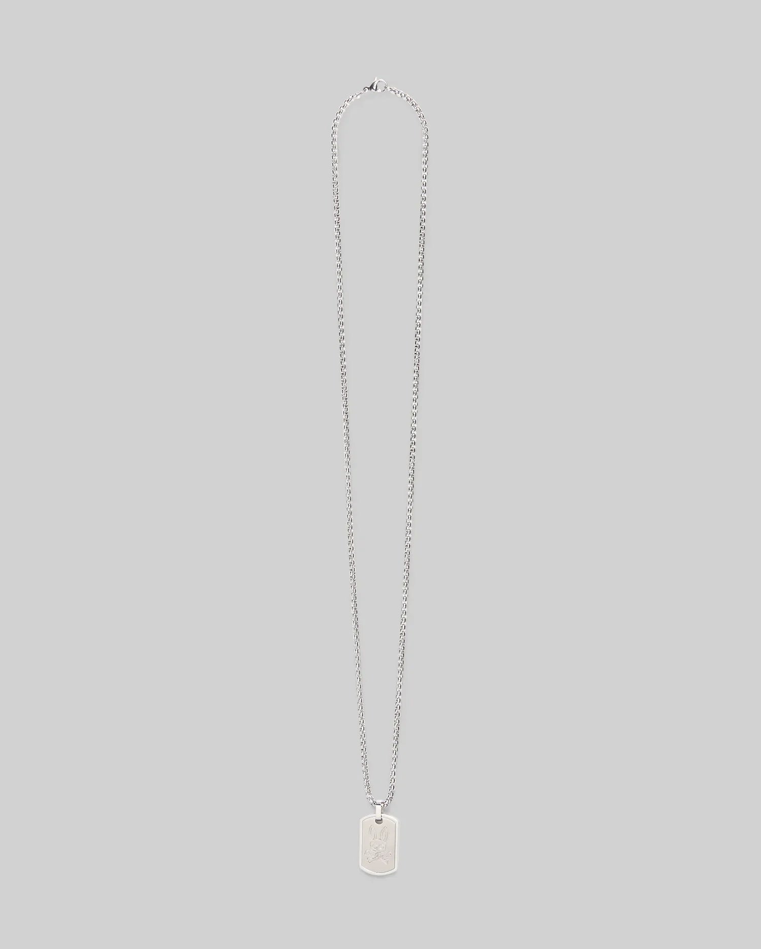 The Psycho Bunny MENS ARMY TAG NECKLACE - MO1700021 features a silver rectangular dog tag pendant on a steel cable chain, shown against a plain light gray background.