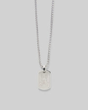 The Psycho Bunny MENS ARMY TAG NECKLACE - MO1700021 features a silver pendant engraved with a cartoon bunny face, shown against a light gray background.