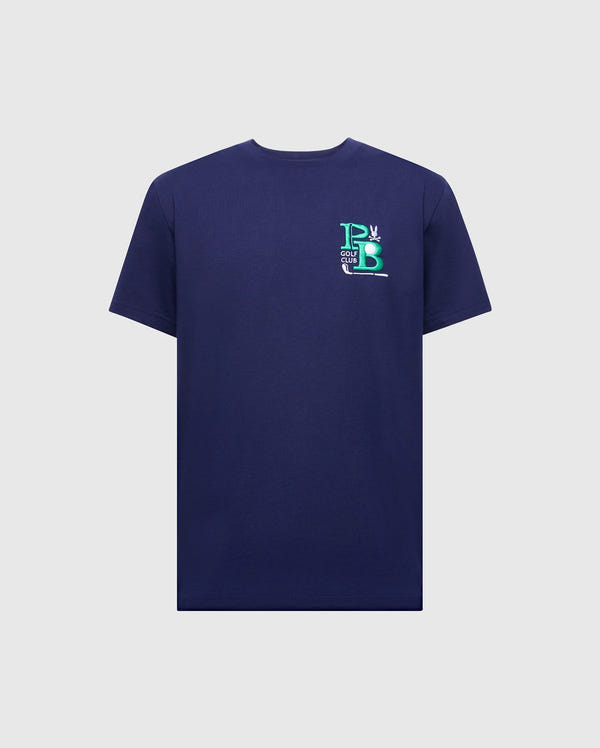 The MENS DENIS GRAPHIC TEE - MT0200015 from Psycho Bunny is a navy blue, Pima cotton T-shirt with a crew neck. It has an embroidered "PB" logo in blue and green on the left chest against a light gray background.