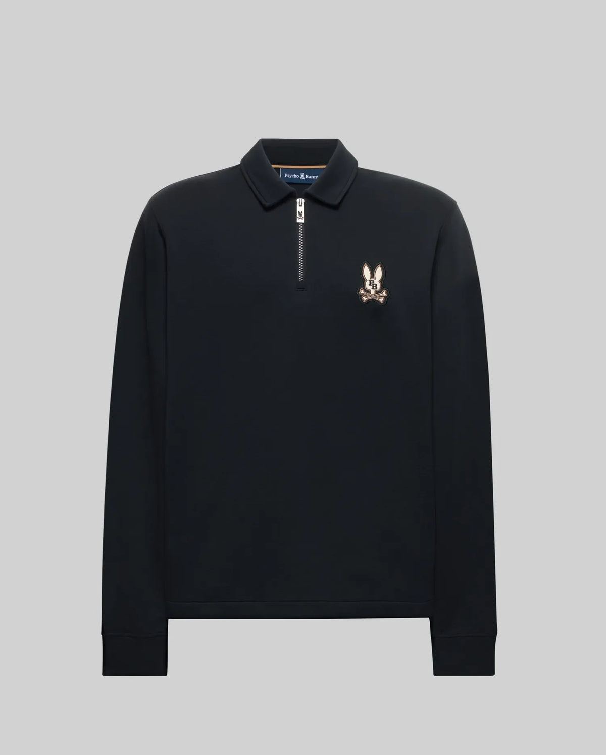The Psycho Bunny MENS DANIEL QUARTER ZIP SWEATSHIRT (MT0500023) is a black men's long-sleeve pullover with a half-zip collar and an embroidered cartoon rabbit head logo on the left chest, shown against a plain gray background.