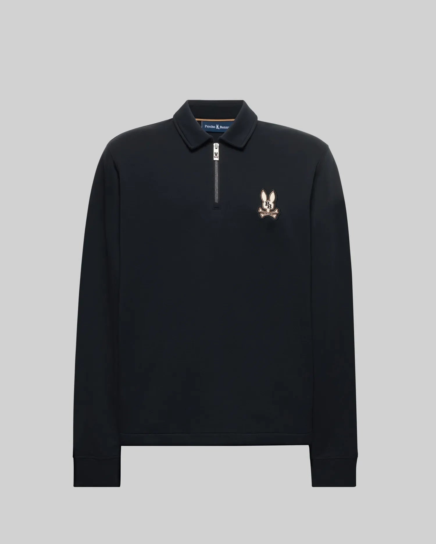 The Psycho Bunny MENS DANIEL QUARTER ZIP SWEATSHIRT (MT0500023) is a black men's long-sleeve pullover with a half-zip collar and an embroidered cartoon rabbit head logo on the left chest, shown against a plain gray background.