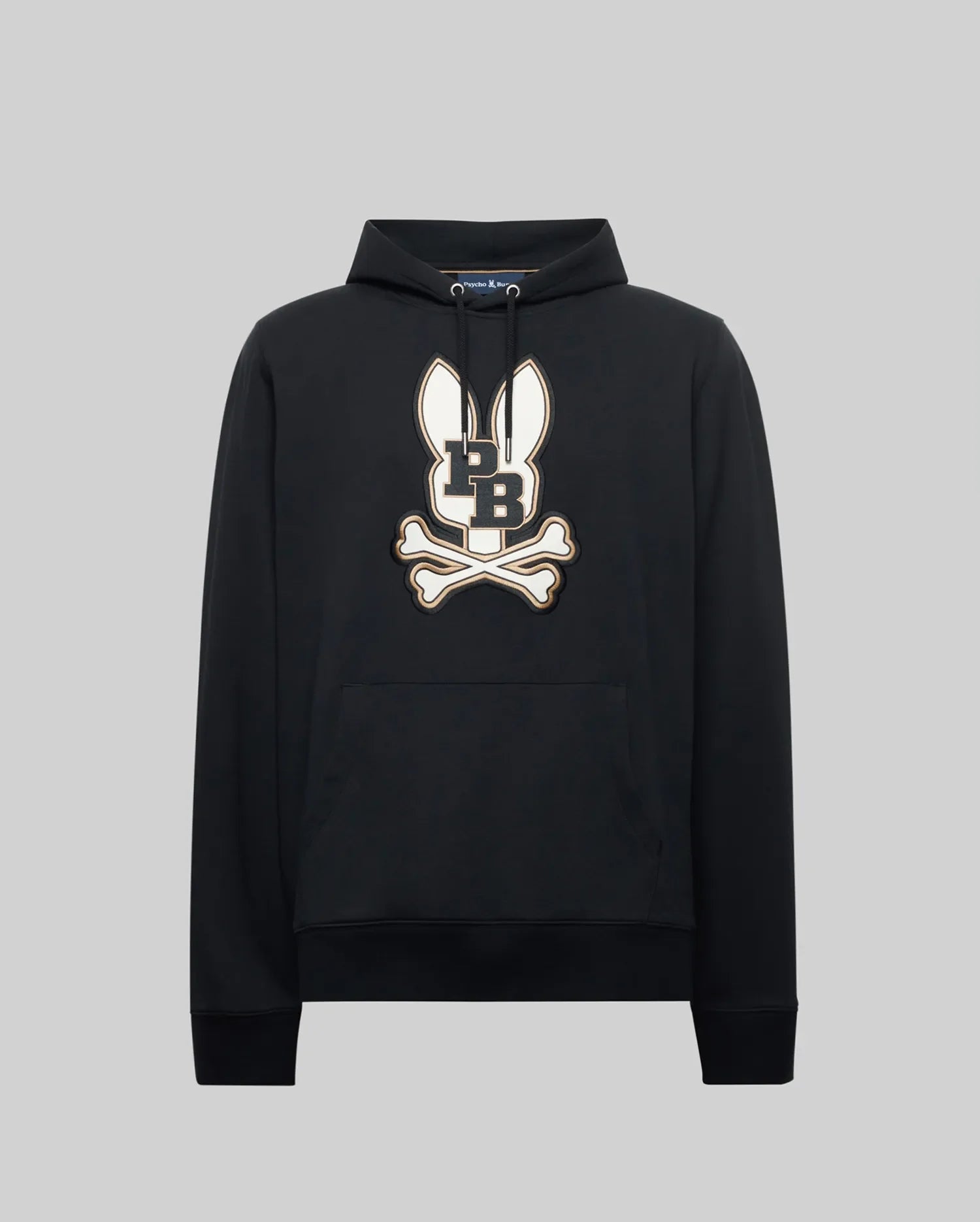 The Psycho Bunny MENS WADE HOODIE (MT0500112) is a classic athletic hoodie made from a premium cotton blend, featuring a bold cartoon bunny head with long ears above crossed bones and "L" and "B," plus a front pocket and drawstring hood.
