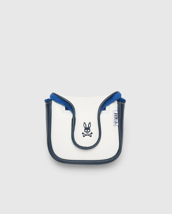 A small, white and blue crossbody bag with black trim, made from durable polyurethane. It showcases a Psycho Bunny logo with crossbones on the front and a side branded tag. Manufactured in China, it's displayed against a plain light background.