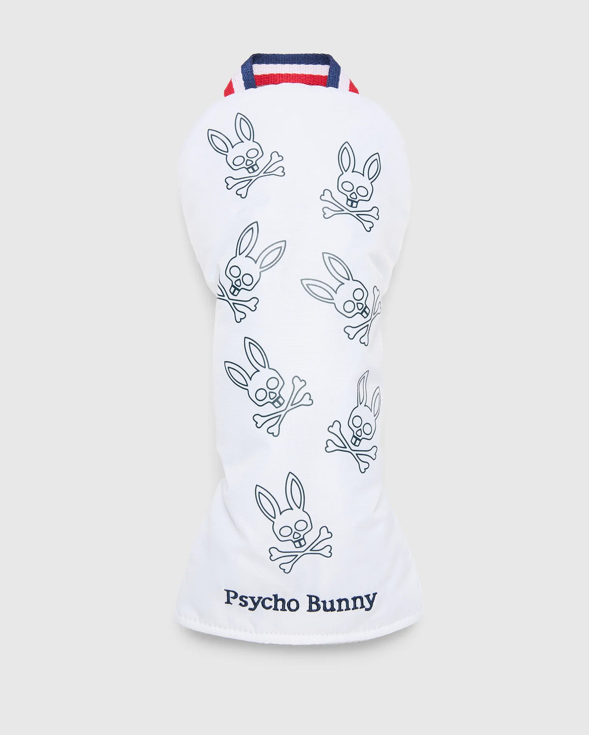 The MULTI BUNNY DRIVER HEAD COVER - PBMG4SH1 by Psycho Bunny features blue bunny with crossbones sketches on white, topped with red, white, and blue striping. "Psycho Bunny" is embroidered at the base. It offers padded protection to keep your gear safe and stylish on the course.