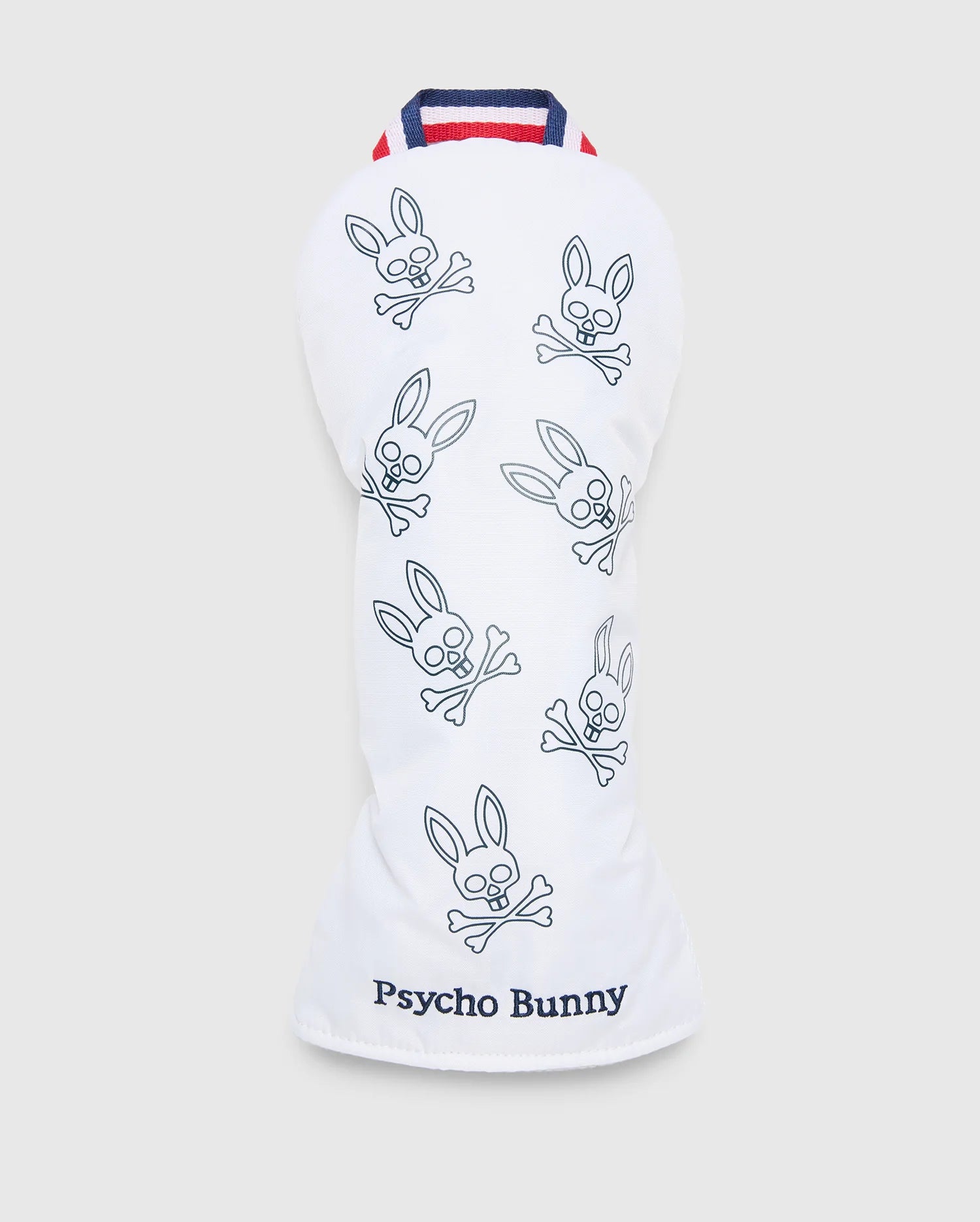 The MULTI BUNNY DRIVER HEAD COVER - PBMG4SH1 by Psycho Bunny features blue bunny with crossbones sketches on white, topped with red, white, and blue striping. "Psycho Bunny" is embroidered at the base. It offers padded protection to keep your gear safe and stylish on the course.