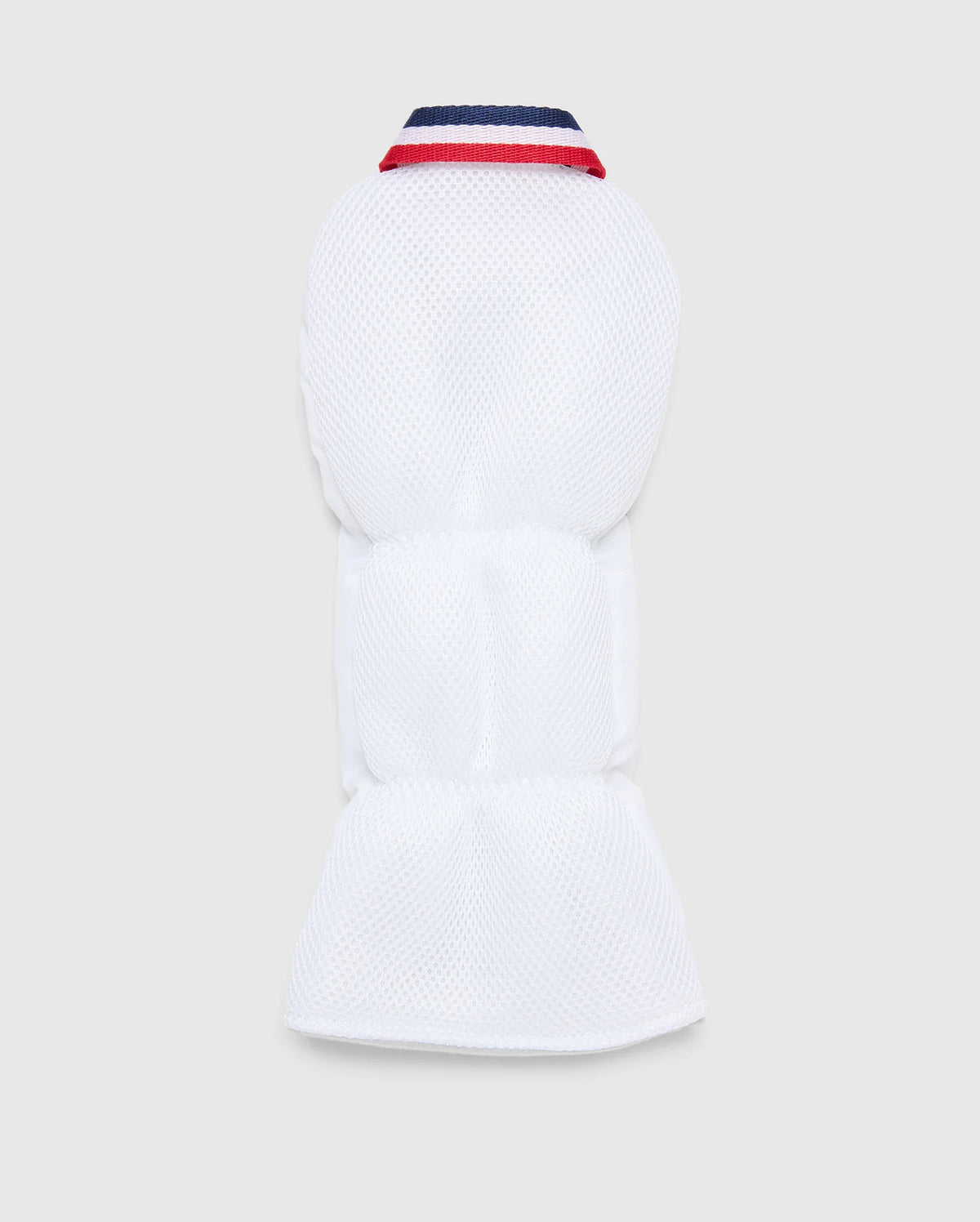 The white padded MULTI BUNNY DRIVER HEAD COVER - PBMG4SH1 by Psycho Bunny combines warmth and style with its quilted texture, navy-blue and red collar, and minimalist design. The embroidered logo adds a subtle elegance to the sleek look against a plain background.