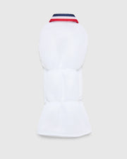 The white padded MULTI BUNNY DRIVER HEAD COVER - PBMG4SH1 by Psycho Bunny combines warmth and style with its quilted texture, navy-blue and red collar, and minimalist design. The embroidered logo adds a subtle elegance to the sleek look against a plain background.