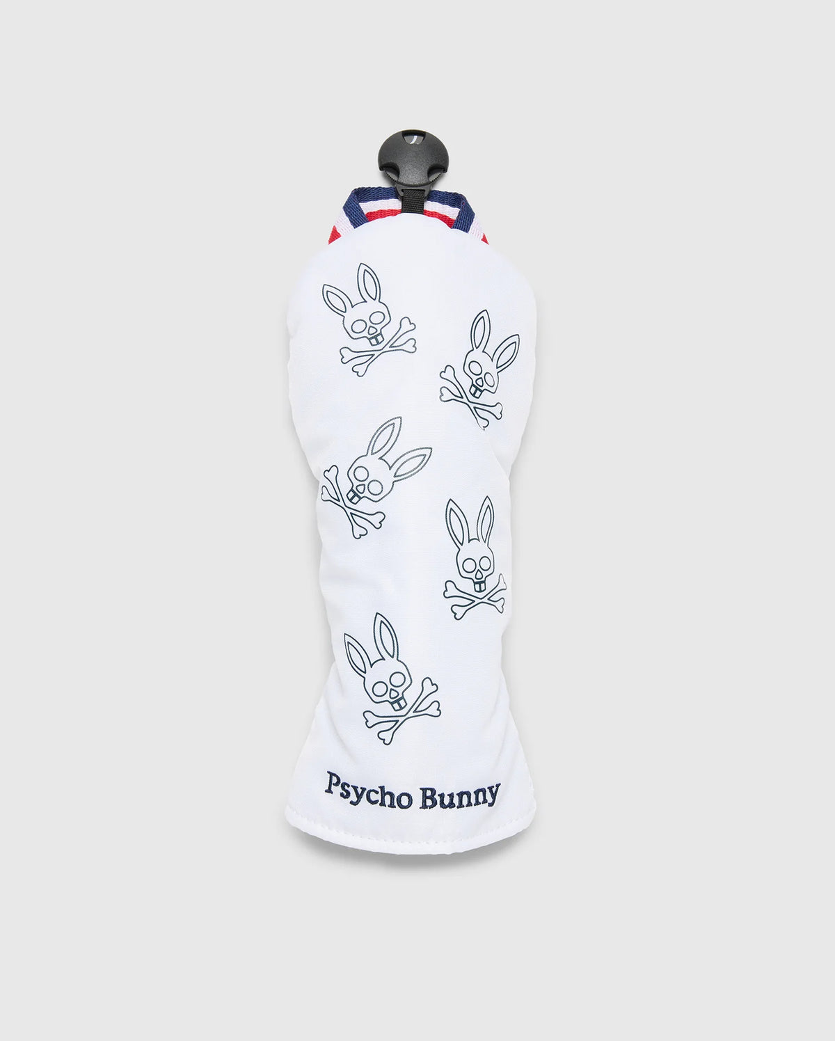 The MULTI BUNNY FW HEAD COVER FW - PBMG4SH2 by Psycho Bunny features blue-outlined bunny skull logos and crossbones on white. "Psycho Bunny" is embroidered at the bottom, with red and blue striped detailing at the top for a stylish golf gear upgrade.
