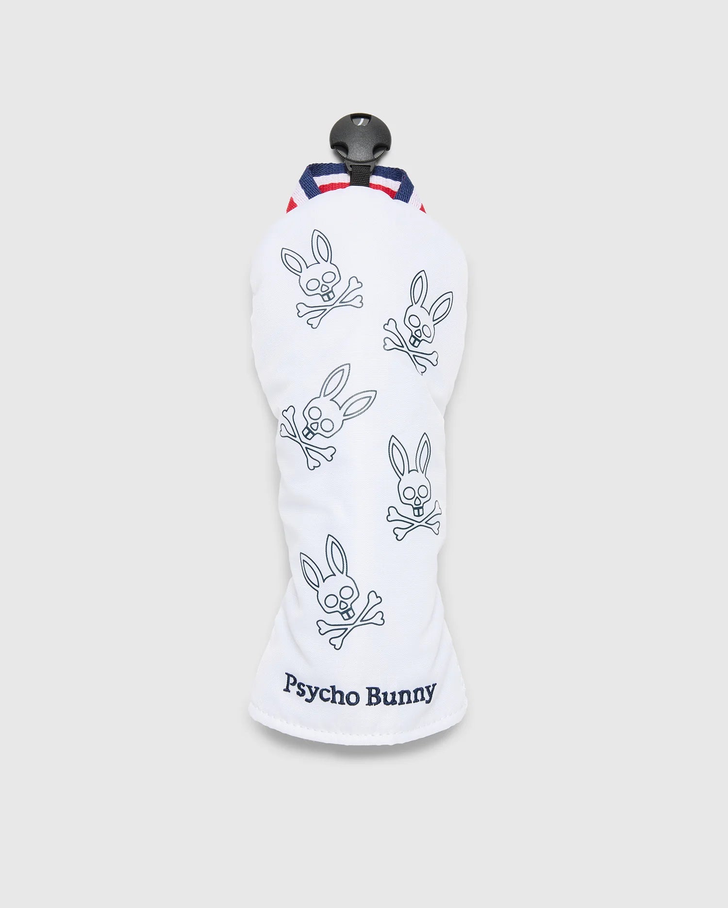 The MULTI BUNNY FW HEAD COVER FW - PBMG4SH2 by Psycho Bunny features blue-outlined bunny skull logos and crossbones on white. "Psycho Bunny" is embroidered at the bottom, with red and blue striped detailing at the top for a stylish golf gear upgrade.