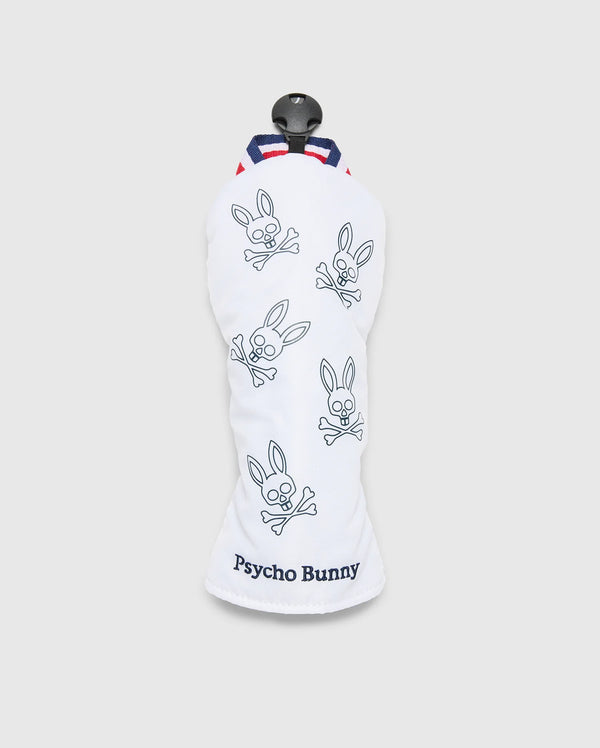 The MULTI BUNNY FW HEAD COVER FW - PBMG4SH2 by Psycho Bunny features blue-outlined bunny skull logos and crossbones on white. "Psycho Bunny" is embroidered at the bottom, with red and blue striped detailing at the top for a stylish golf gear upgrade.