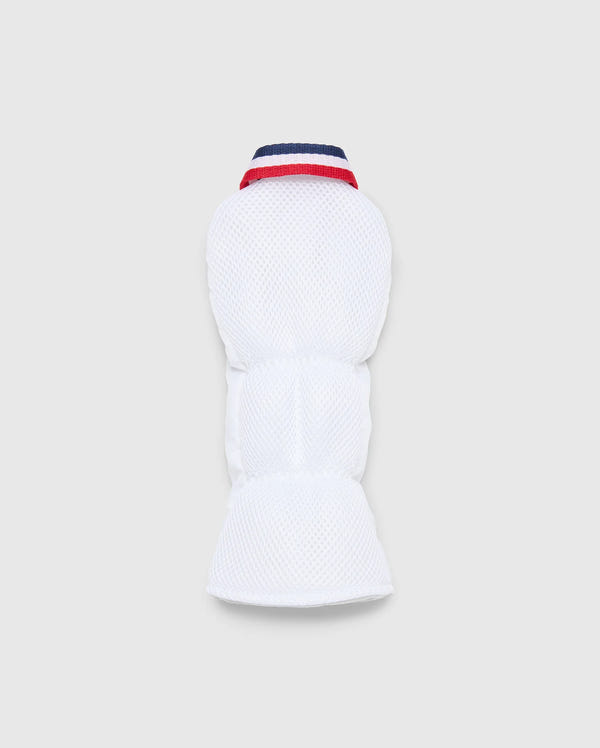 The MULTI BUNNY FW HEAD COVER FW by Psycho Bunny features a red and blue striped collar and a textured pattern, perfect for cold weather. This high-quality pet puffer jacket has a sleeveless design and is displayed on a plain background. Product Code: PBMG4SH2.
