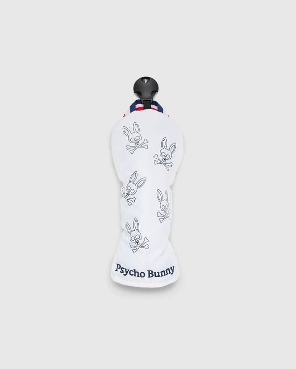 The MULTI BUNNY HYBRID HEAD COVER - PBMG4SH3 by Psycho Bunny features a white ripstop fabric with a blue logo, bunny skull motifs, a black top handle, and red-white-blue striped trim on a light gray background, offering PGA-ready style.